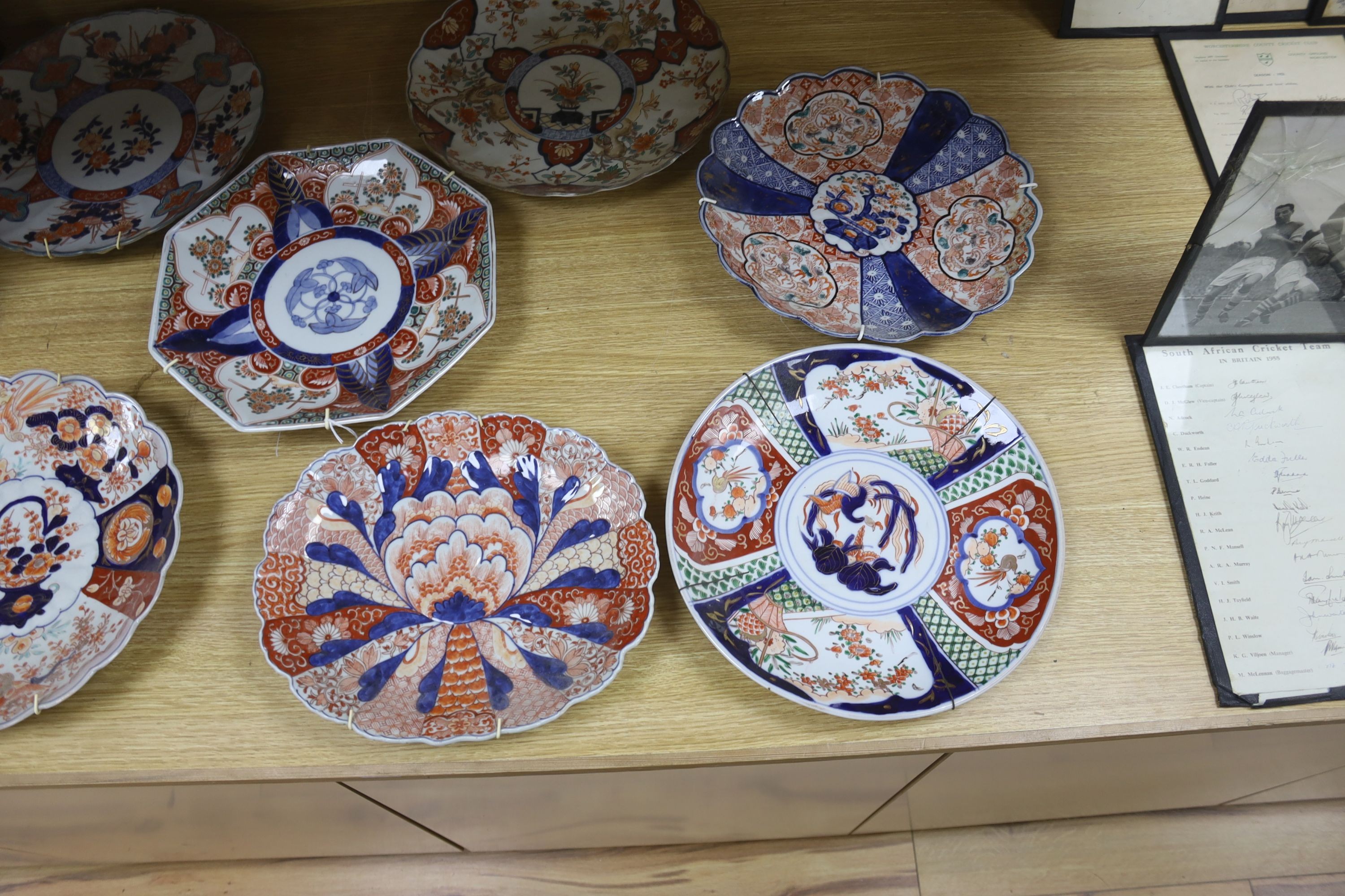 Seven various Japanese Imari dishes, late 19th century, 29.5 to 30.5cm wide